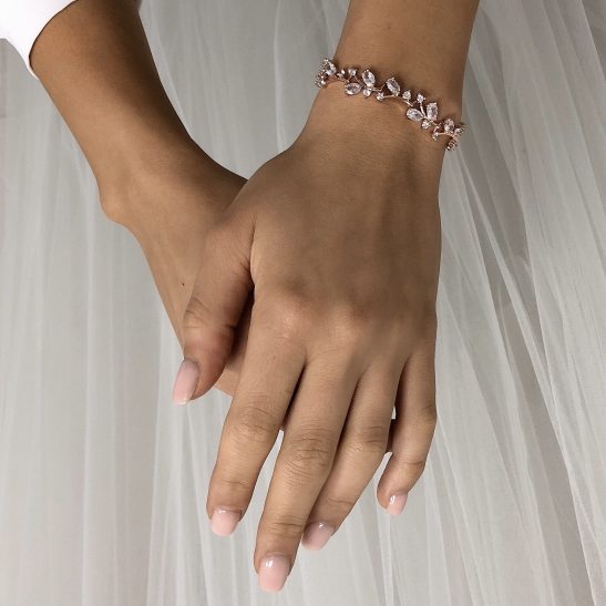 Whether a statement piece or a fine bridal bracelet, our AAA grade Cubic Zircon bracelets are the perfect finishing touch to your wedding ensemble. Your wedding bracelet will sparkle brilliantly as you cut the cake, toast to your wedding and of course put the wedding band on. The crystals, cut like diamonds are the finest quality and finished in Rhodium (nickel free) metal. We can custom the length to fit your wrist size. Just mention the length you need when ordering.