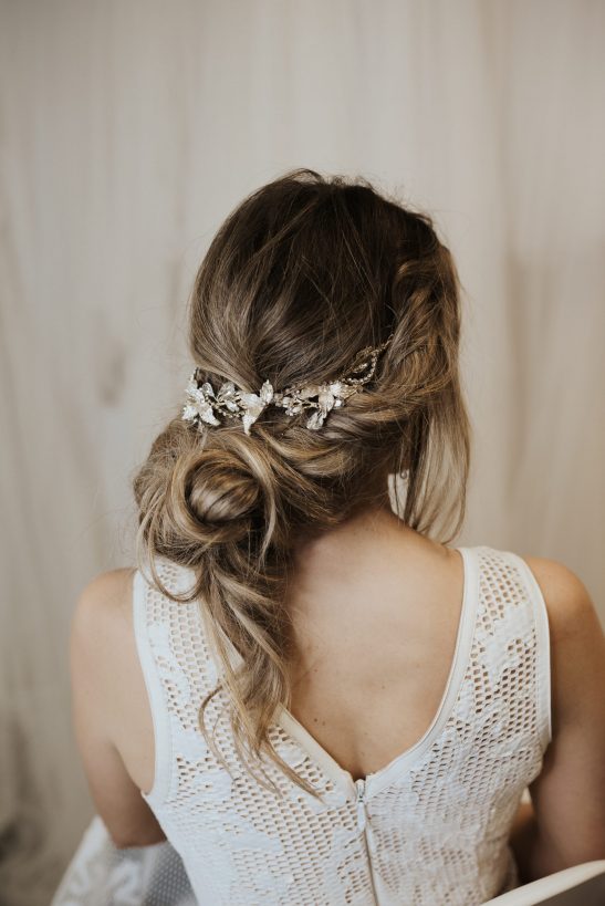 This bridal headband consists of a striking arrangement of silver and crystals that is chic and stylish. No matter the hair style, this head piece always works, fitting in perfectly with either a messy bun, half up bridal hair or the ‘on trend,’ finger waves with middle part. With an abundance of crystals you will feel gorgeously glamorous every time you wear this high-fashion creation.