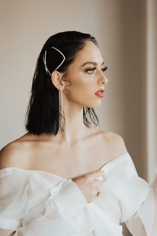 This epic design bridal earring really channels a mood of Hollywood glamour and will look as stunning at your wedding as the red carpet. With 3 different lengths these dangly darlings look effortlessly chic and modern. If you enjoy looking glamorous and well put together you will gravitate towards this modern take on a classic bridal earring.