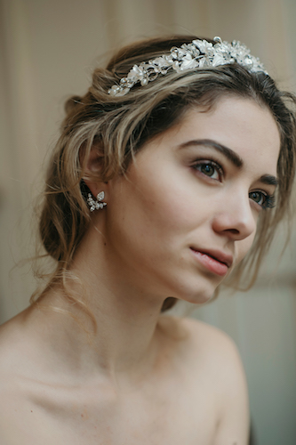 Beautiful details are created by entwining pearls, crystals and flowers to form this stunning silver bridal floral crown. This 'on trend' bridal headband can be worn in many hair style variations, and is the perfect addition to your wedding look or hens night. Fresh water pearls and swarovski crystal pop out amongst the flowers, reminiscing of a cottage garden, and really add a beautiful depth and texture to the silver flower crown.