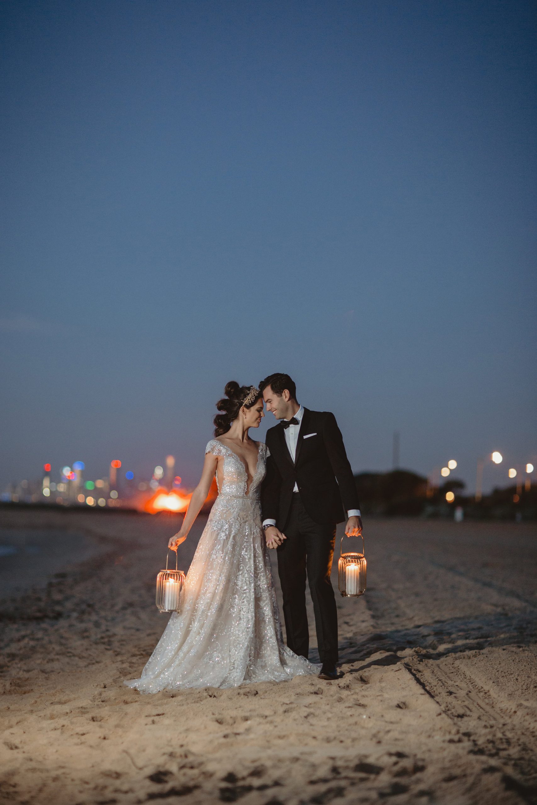bride and groom on beach at sunset in Melbourne